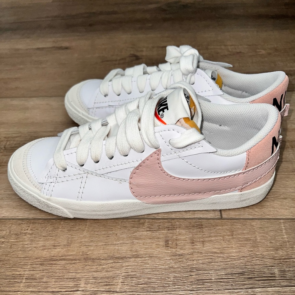 Pink and white Nike blazers
